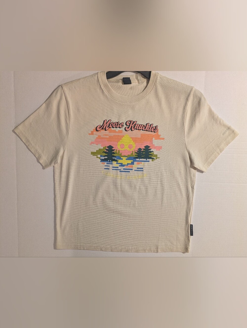 Moose Knuckles Cream Short Sleeve Tee with Retro Pixel Sunset Graphic- XS (NWOT)